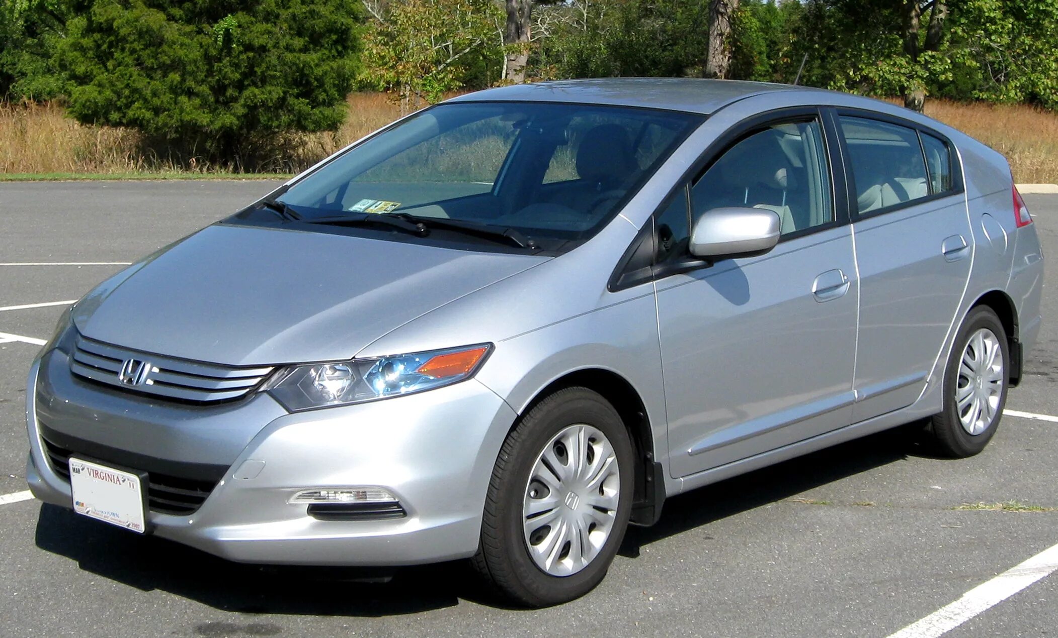 Инсайт 1. Honda Insight Hybrid 2010. Honda Insight II 2010. Хонда Инсайт гибрид 2009. Хонда Инсайт гибрид.