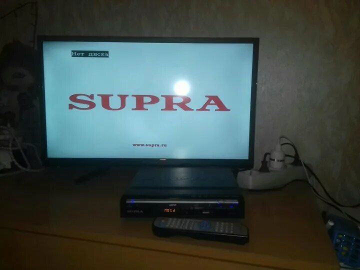Supra нет сигнала. Телевизор супра с двд. dvd-плеер supra dvs-055xk. supra заставка dvd проигрыватель. меню телевизора supra.