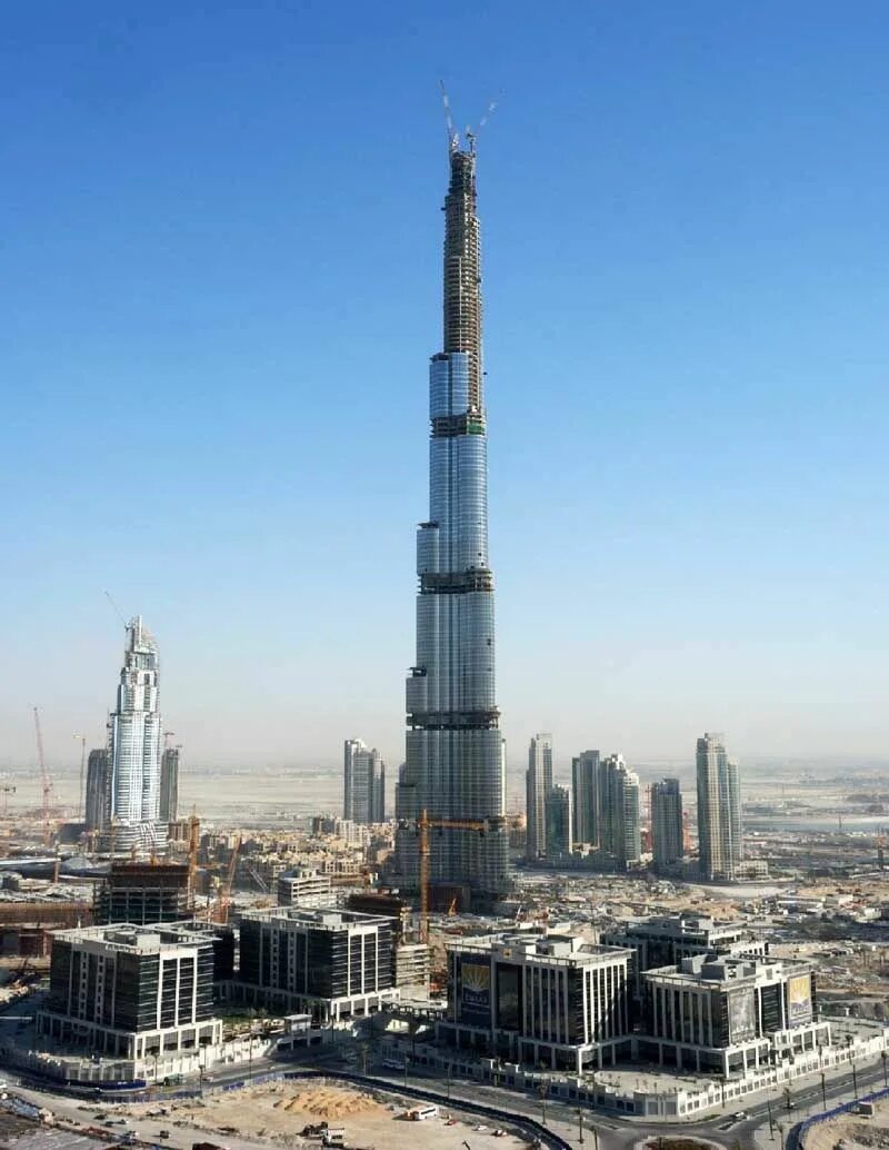 Самая большая высокая. Самый высокий небоскреб Бурдж-Халифа. Небоскреб Дубай Бурдж. Башня Бурдж Халифа стройка. Дубай здание Бурдж Халифа.