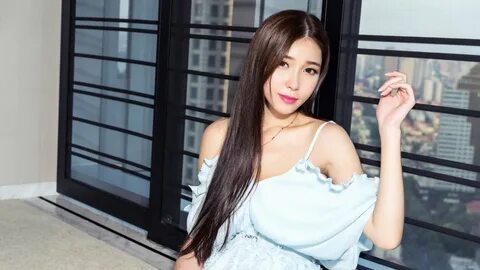 Beautiful girl with black hair and shoulders 4K wallpaper. 