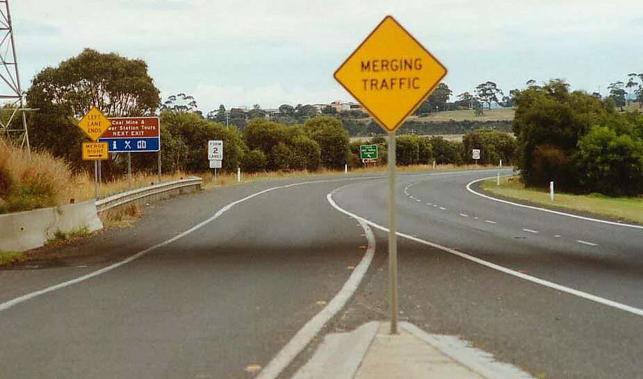 Merging left Lane. Road signs in Australia. Git приколы. Lane ends left sign.