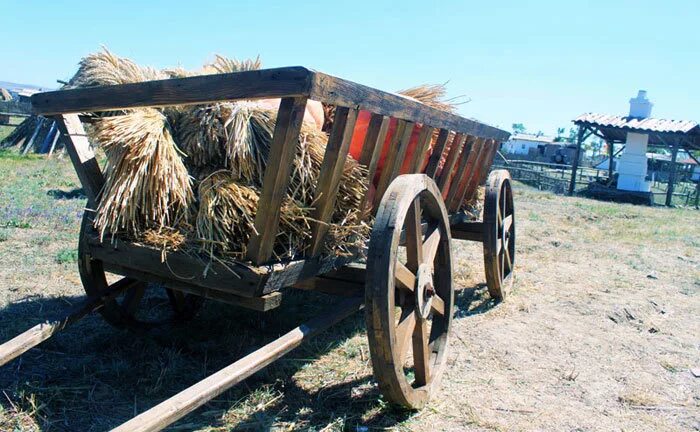телега. воз тележка. воз тележка. тележка деревянная на колесах. телега.