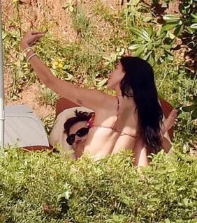 DUA LIPA in Bikini at a Pool in Barcelona 06/06/2022.