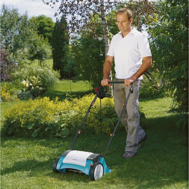 Аэратор вертикуттер для газона. Gardena evc 1000. скарификатор-аэратор gardena. аэратор evc 1000 gardena. скарификатор для газона гардена.