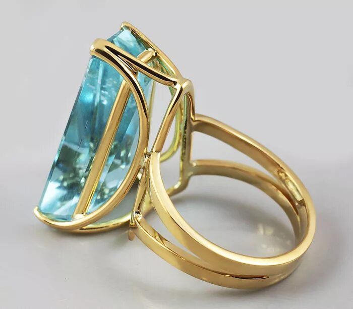 кольцо с аквамарином в золоте. украшения с аквамарином в золоте. аквамарин с золотом. аквамарин с золотом. золотое кольцо с аквамарином 585 проба.