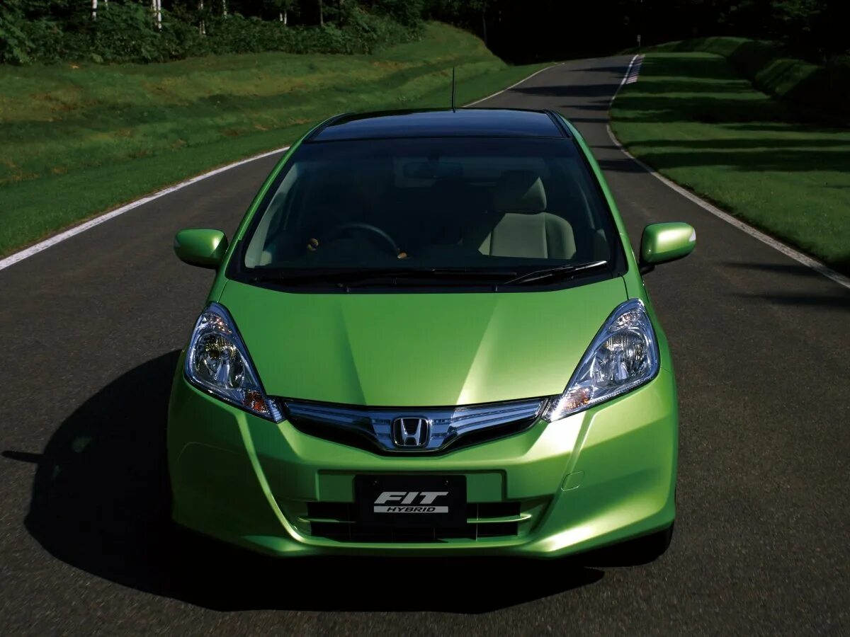 Машина honda fit. Honda Fit 2010. Honda Fit gp1 Hybrid. Хонда фит гибрид 2010. Honda Fit II 2010.