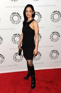 Archie Panjabi in BOOTS.