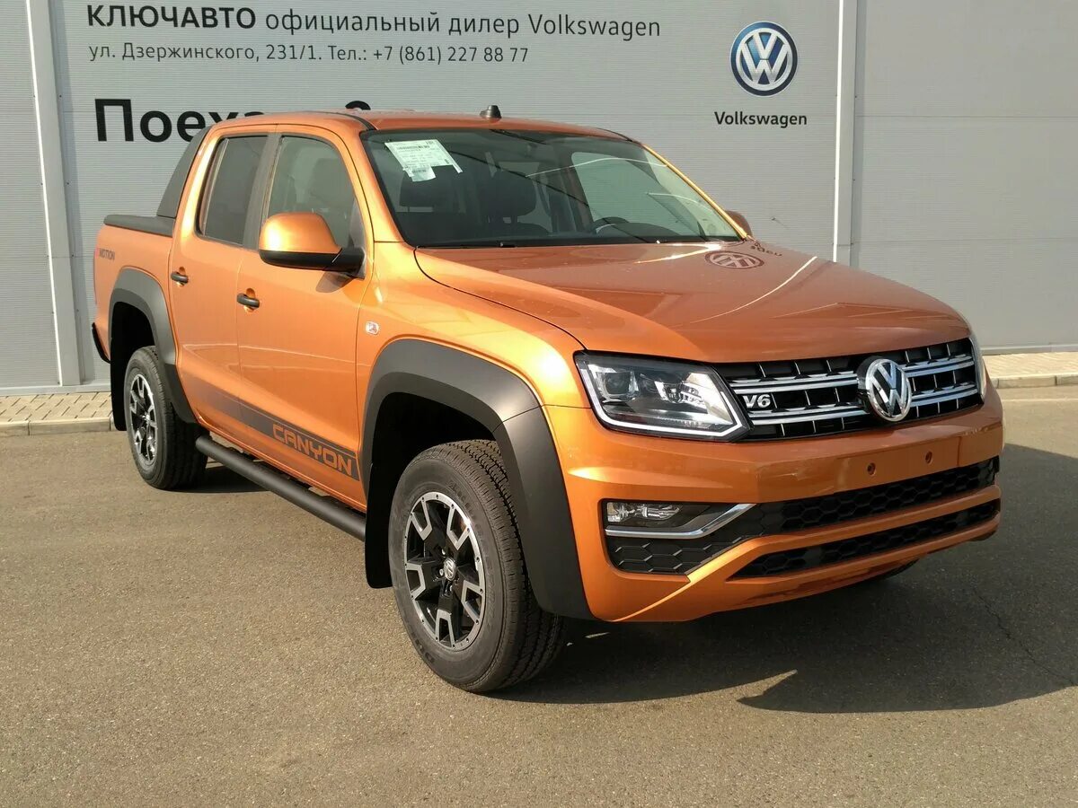 Купить амарок дизель. Volkswagen Amarok оранжевый. Фольксваген Амарок оранжевый пикап. Фольксваген Амарок 2020 оранжевый. Машина Фольксваген Амарок 2019 года.