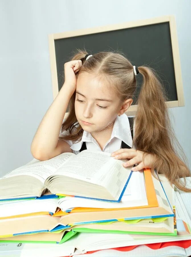 Make your homework. Работа с девочками в школе. Как делать девочек на книжке. Girl making homework. Girl behind School Desk photo.