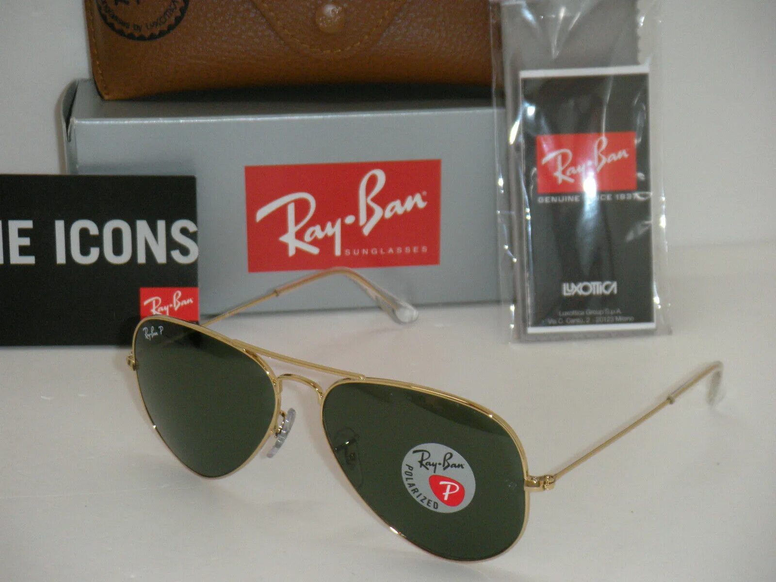 Как отличить очки ray ban. Очки Рей Бен 3025. Очки ray ban 3025 Aviator large Green Gold. Очки ray ban Luxottica.