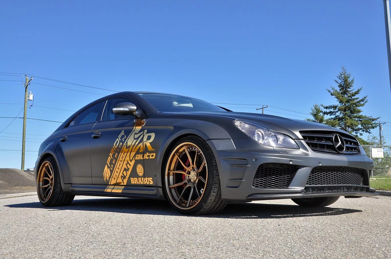 Mercedes Benz CLS 55 AMG. CLS 63 AMG body Kit. Mercedes CLS 55 AMG Tuning. CLS 55 AMG Black колеса.