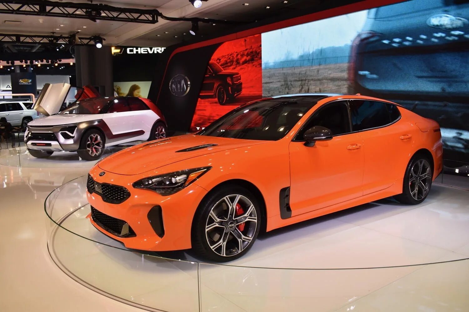 Киа Стингер. Kia gt4 Stinger. Киа Стингер оранжевый. Kia Stinger GTS.