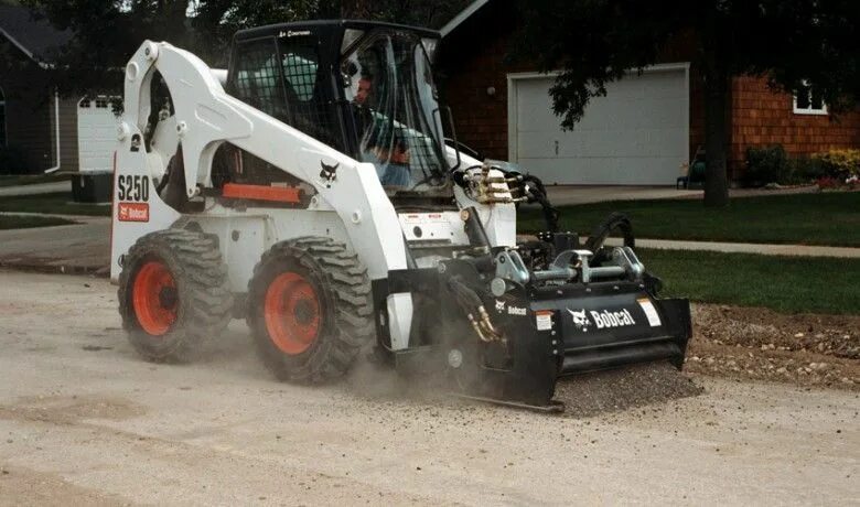 Фреза дорожная на Bobcat. Фреза для асфальта Bobcat. М.погрузчика Bobcat фреза. Бобкэт с фрезой. Фреза на бобкэт