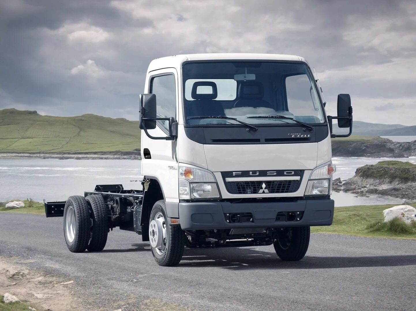 Куплю митсубиси кантер фусо. Mitsubishi Fuso Canter. Митсубиси Fuso Canter. Грузовик Митсубиси Фусо. Мицубиси Фусо грузовой.