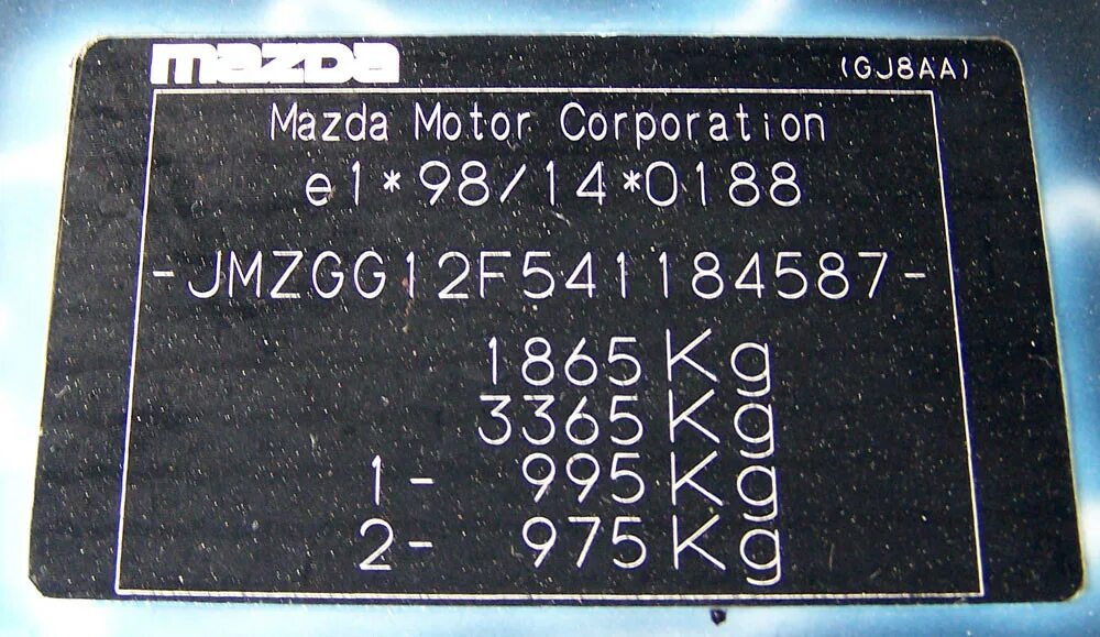 Код краски мазда 6. Mazda CX 5 VIN табличка. Mazda 2 2003 VIN. Mazda CX 7 вин номер. Mazda CX-7 табличка VIN.