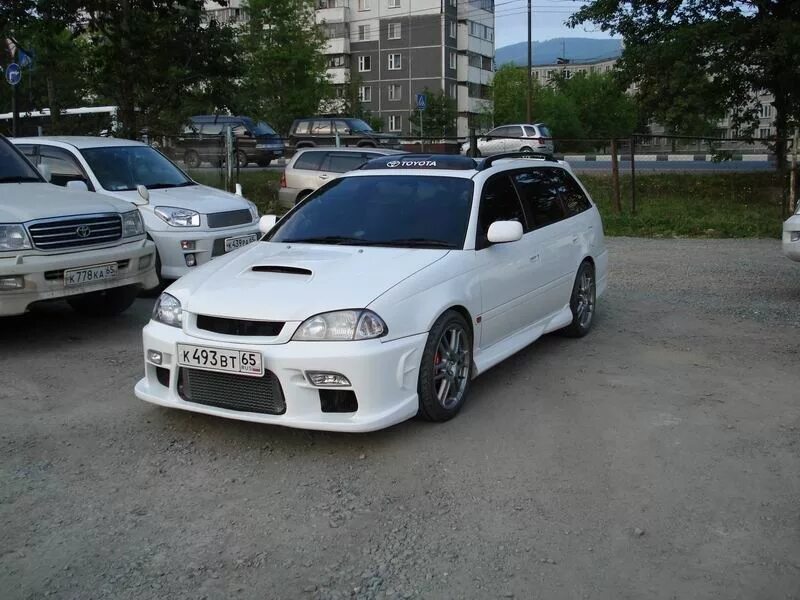 Калдина 215 купить. Калдина 215 gt-t. Тойота Калдина st215. Toyota Caldina st215 GTT. Обвес Caldina st215.