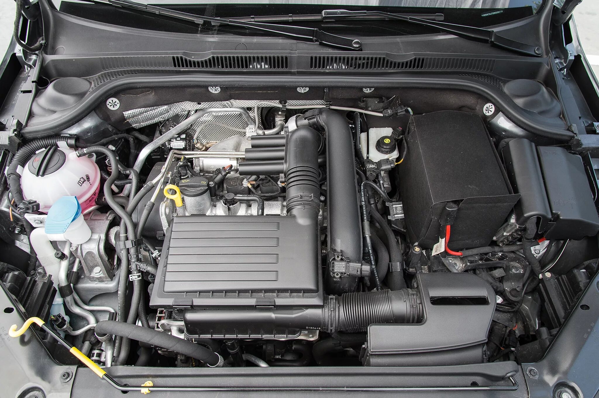 Volkswagen jetta какой двигатель. Volkswagen Jetta 6 1.4 мотор. Фольксваген Джетта двигатель 2.0. Мотор 1.6 Фольксваген Джетта 2014. Jetta 1.8 двигатель Volkswagen.