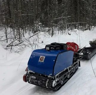 Мотособака по глубокому снегу