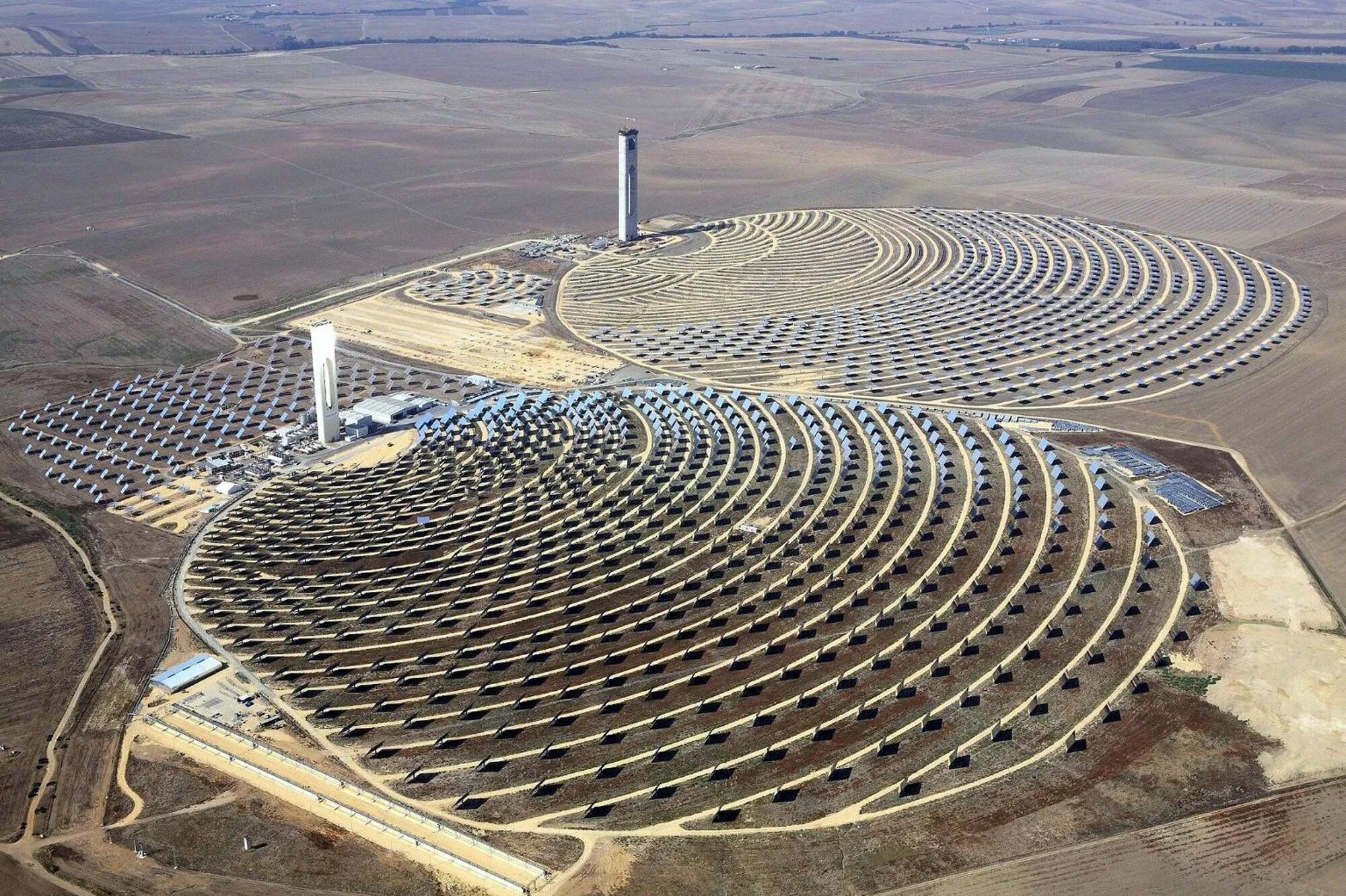 Какая электростанция самая крупная. Ps10 Солнечная электростанция. Солнечная электростанция Севилья Испания. Испанская Солнечная электростанция planta Solar 10. Марокко Солнечная электростанция Варзазат.