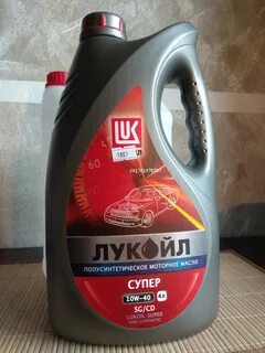 Заливаю масло лукойл