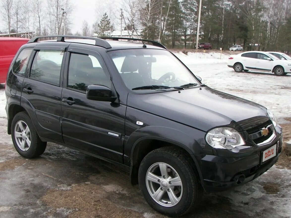 Авито ставропольский край шевроле нива. Шевроле Нива 1 Рестайлинг. Chevrolet Niva i Рестайлинг чёрный. Шевроле Нива 300 авто. Нива Шевроле Люкс 2012.