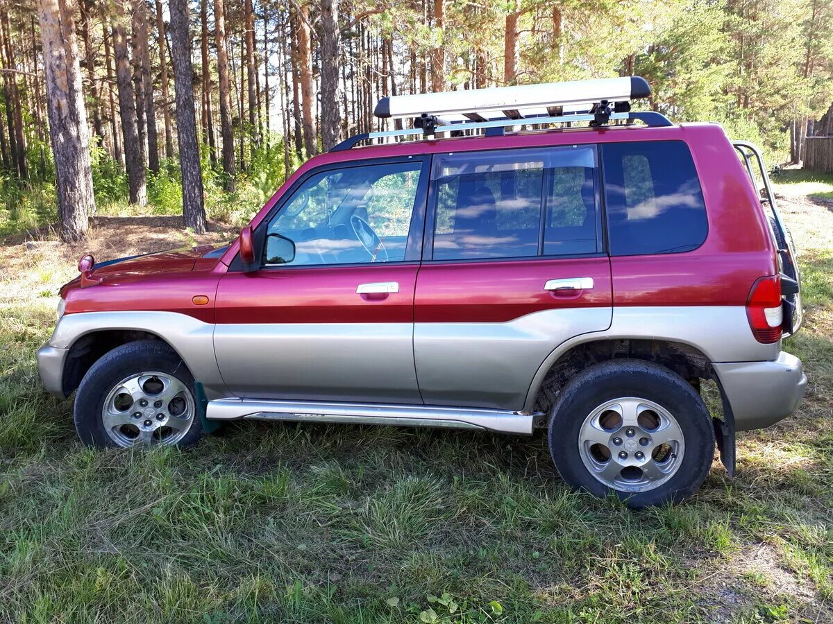 Паджеро 2001 года. Mitsubishi Pajero 2001. Митсубиси Паджеро 2001г. Mitsubishi Pajero io 2001. Митсубиси Паджеро 2 2001.