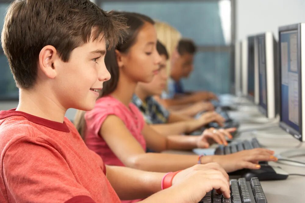 Do you often use a computer. Students use computers at their lessons в пассивном. students computer class photo. boy working computer. boy at the computer.
