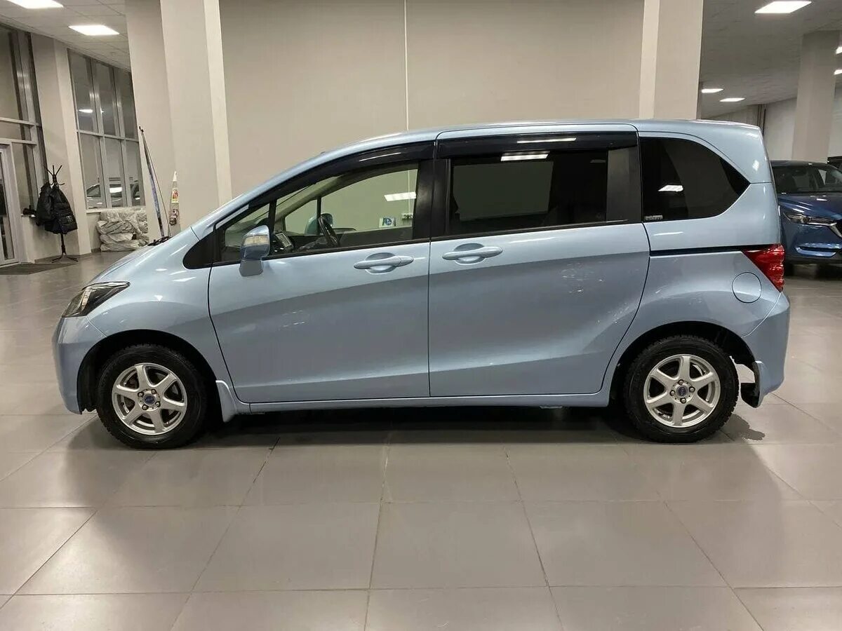 Honda freed 2009. Хонда Фрид 2009г. Тойота Фрид 2009. Хонда Фрид 2009 7 мест.