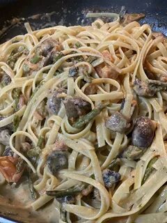 Tonight was fettuccine with roasted mushrooms and asparagus with a fresh to...