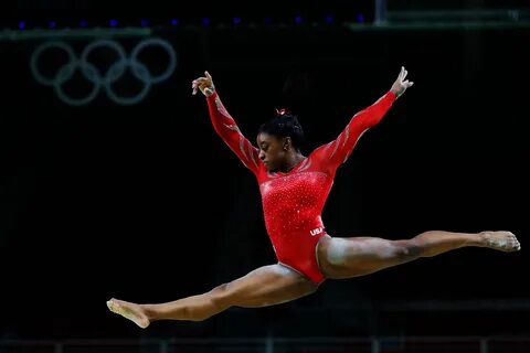 Simone Biles competing in the Olympics.
