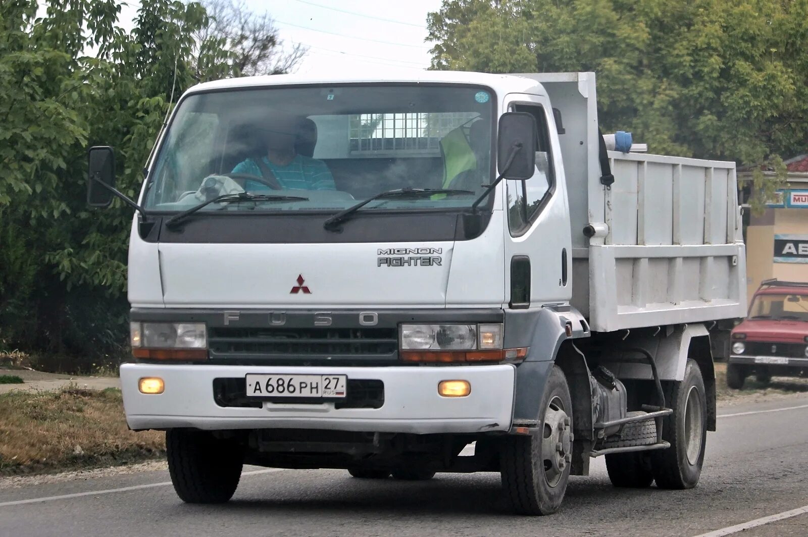 Митсубиси файтер купить. Митсубиси Фусо Файтер. Mitsubishi Fuso Canter 5 тонн. Mitsubishi Fuso самосвал 5 т. Митсубиси Fuso 1992 самосвал.