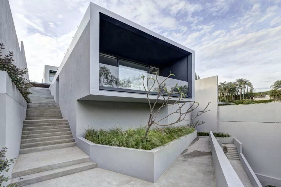 Бетонный домик. Дом от Elías Rizo arquitectos. Архитектурный бетон в30. Архбетон белый. Бетонное здание.