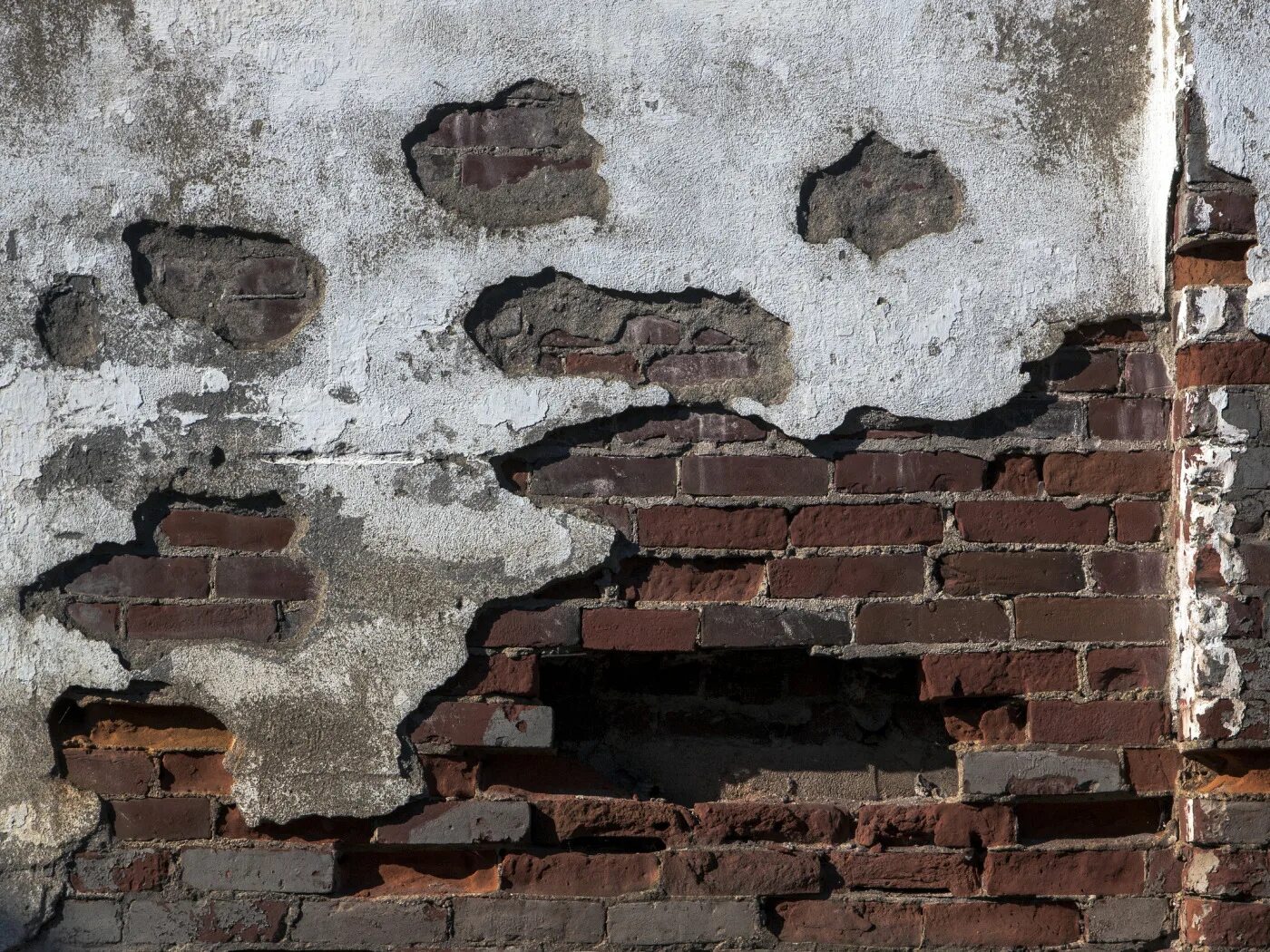 Трудности и препятствия. Отбойный молоток в работе. Шар молот для разрушения зданий. Человек пробивает стену. Демонтаж стен.