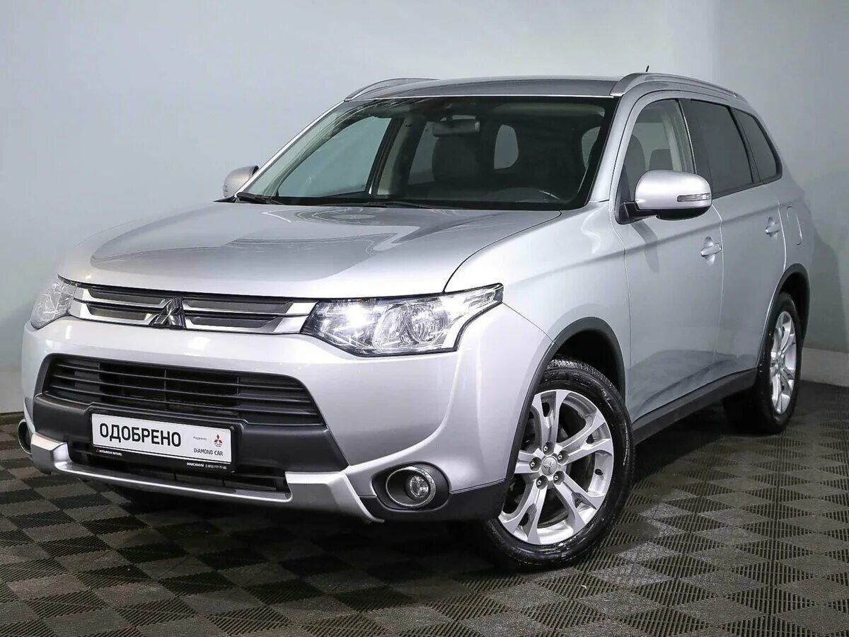 Митсубиси аутлендер какие поколения. Mitsubishi Outlander III. Mitsubishi Outlander III 2014. Митсубиси Outlander 3. Митсубиши Аутлендер 2014.