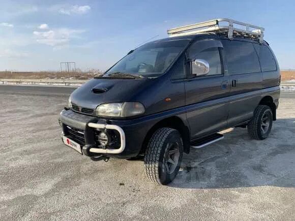 Mitsubishi Delica 1995. Делика 2.8 расход. Концевик включения WD Delica 1995 год.