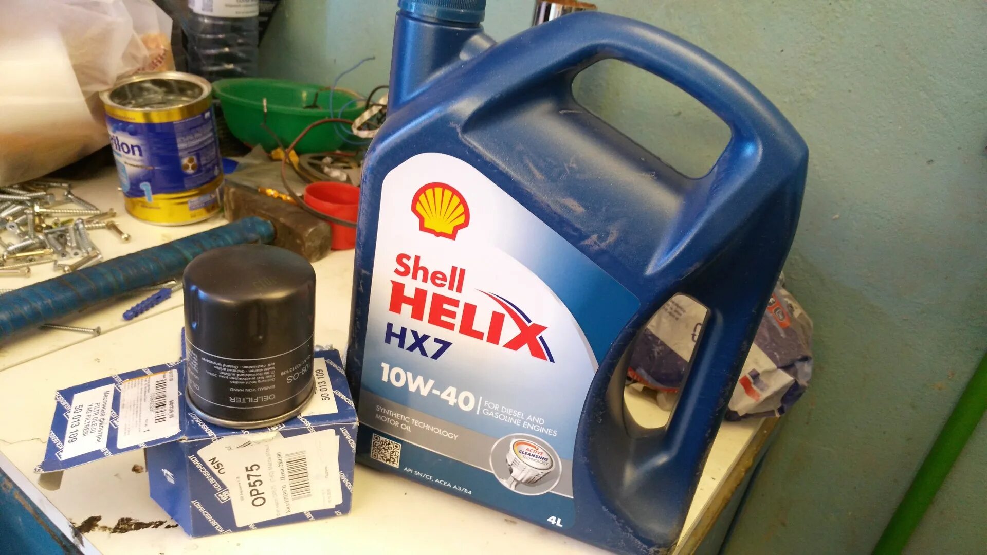 Масле 6 ые. Масло Shell Helix hx7 5w30. Shell Helix hx7 4l. Шелл Хеликс 5 на 40 синяя канистра.