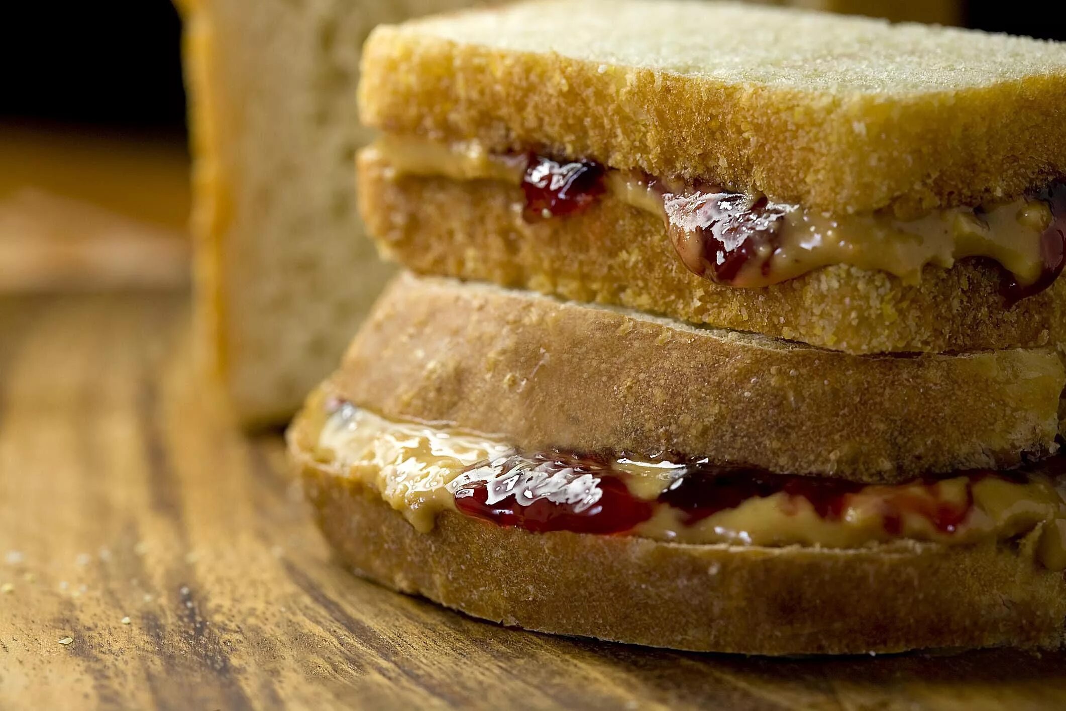 Бутерброд маслом вверх. Peanut butter and jelly sandwich. сэндвич с арахисовым маслом и желе. сэндвич с арахисовым маслом. бутерброд с арахисовым маслом.