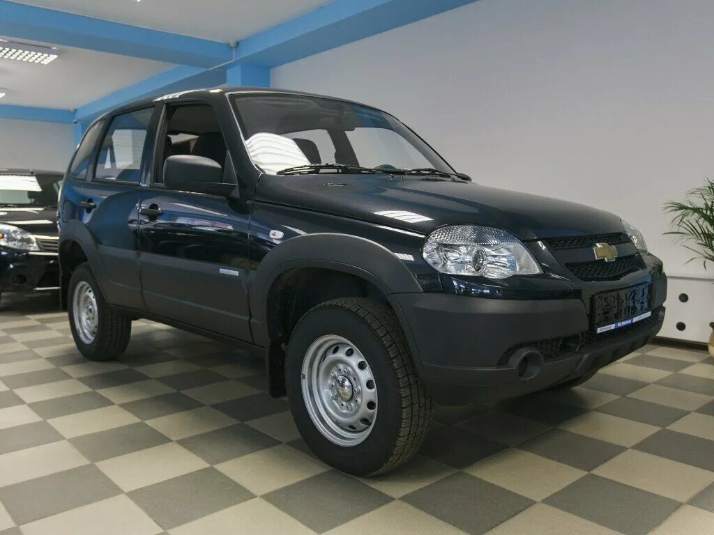 Купить ниву шевроле в ставропольском крае. Chevrolet Niva 2014. Шевроле Нива 2014 Рестайлинг. Chevrolet Chevrolet Niva 2014. Черная Нива Шевроле 2014.