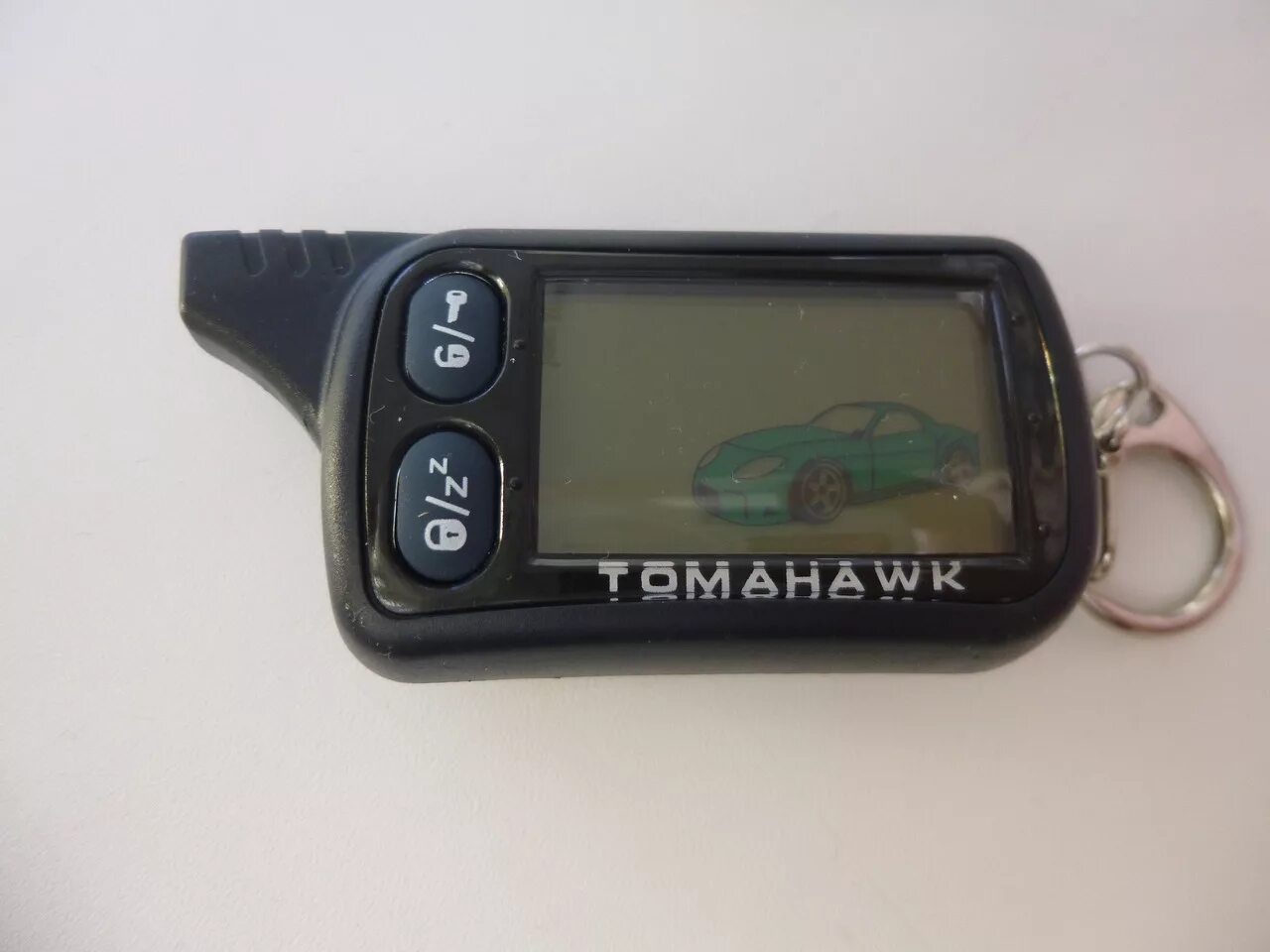 Купить брелок tomahawk. Сигнализация Tomahawk TW-9030. Tomahawk TZ 9020. Tz9030 брелок. Tomahawk 9030 брелок.