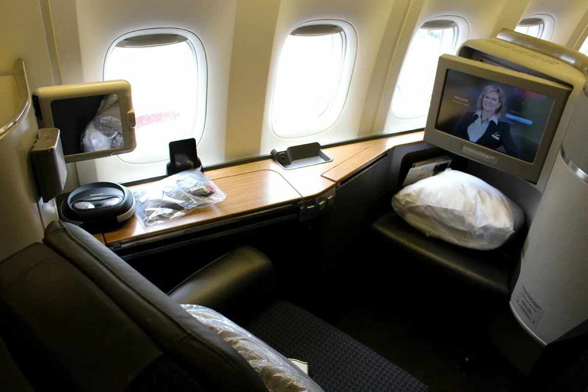 Class product. American airlines first class. первый класс американ эйрлайнс. american airlines suite.