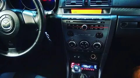 Установка магнитолы мазда