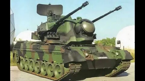 Танк с ракетно пушечным вооружением