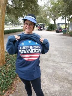 Woman wearing Lets go Brandon shirt.jpg. 