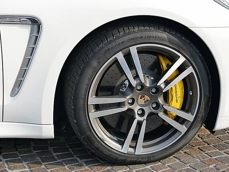 желтые суппорта gs 350. порше 911 с желтыми суппортами. желтые суппорта. покраска суппортов тигуан 2. желтые суппорта.