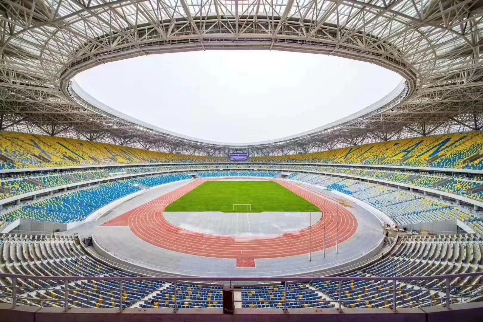 Center stadium. Тяньцзинь Олимпийский стадион. Нанкин Олимпик Спортс центр Стэдиум. Стадион олимпийского спорткомплекса города Циньхуандао. Цзинань Олимпик Спортс центр Стэдиум.