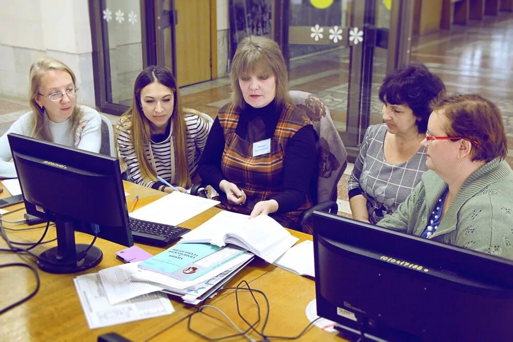 Библиотеки омска сайт. Библиотека ОМГУ. Библиограф. Омские муниципальные библиотеки. День библиографа.