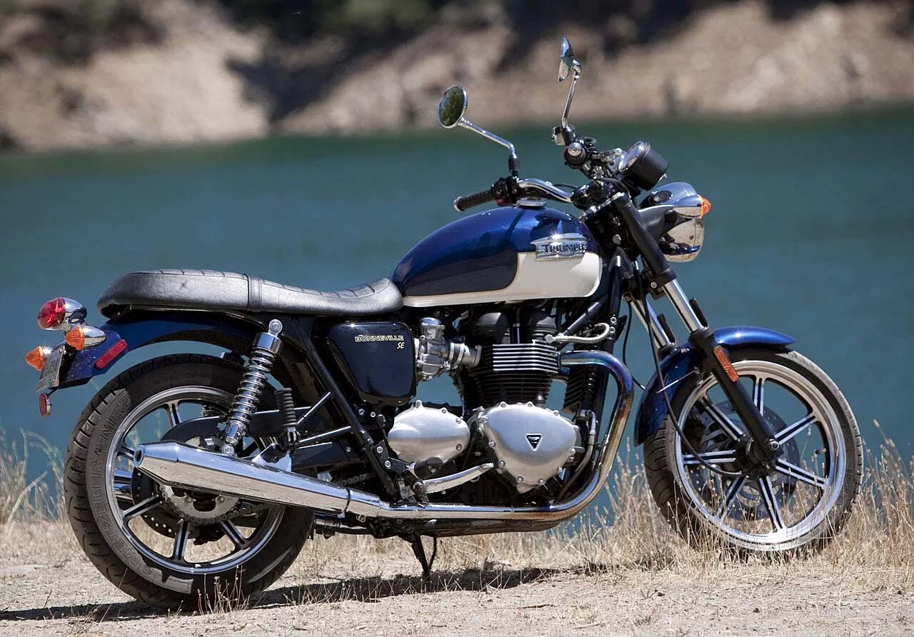 Триумф л. Мотоцикл триумф bonneville. триумф т 100 мотоцикл. триумф бонневиль т100. триумф бонневиль 2009.