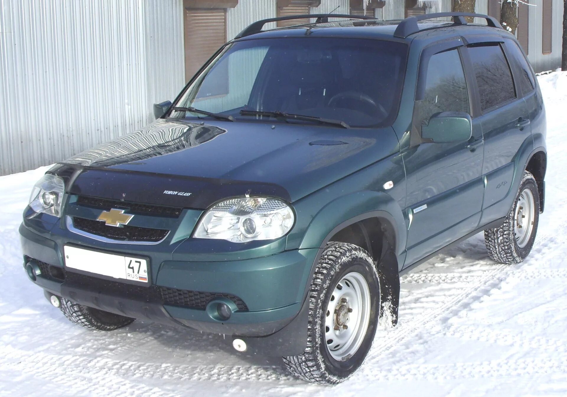 Купить ниву шевроле курской. Шеви Нива 2011. Chevrolet Niva 2011. Тёмна зелёная Шевроле Нива. Шевроле Нива р979мт161.