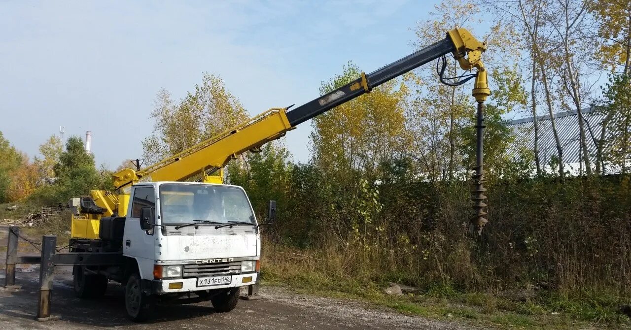 Ямобур иркутск. Ямобур aichi d501. буроям исудзу. камаз буроям. ямобур для свай.