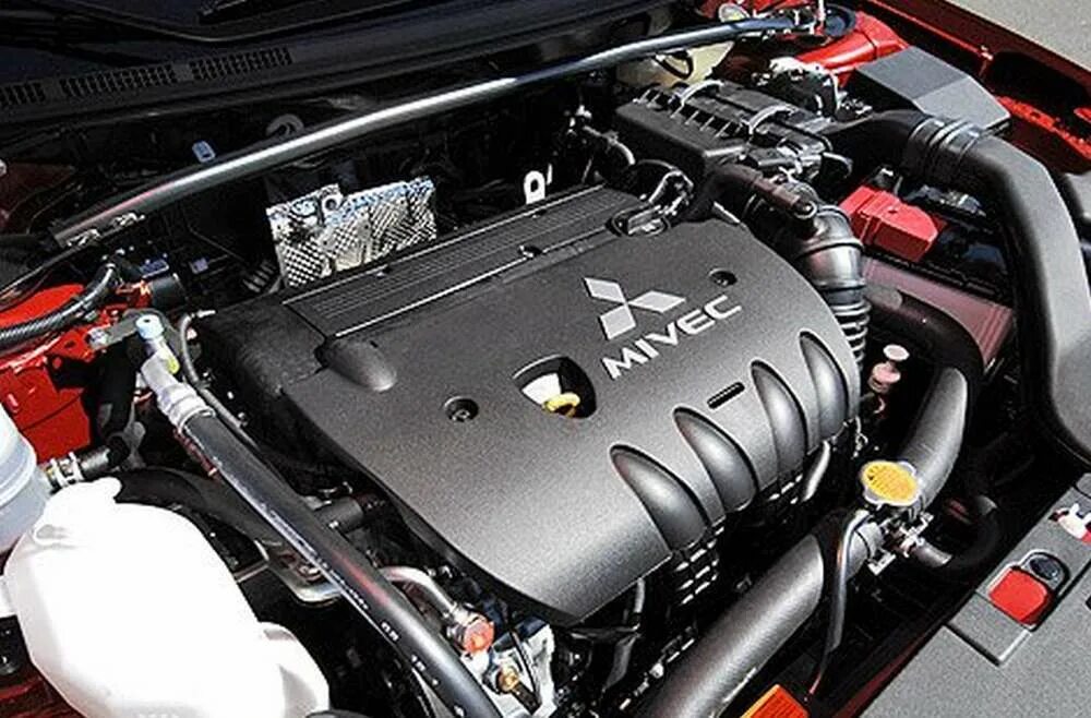 Двигатель Mitsubishi Lancer 10 1.5. Митсубиси Лансер 10 ДВС. Двигатель Лансер 10 2.0. Двигатель Мицубиси Лансер 10.